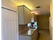 Updated kitchen featuring granite countertops and ample cabinet space at 18938 Ayrshire Cir, Port Charlotte, FL 33948
