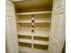 Well-organized pantry with ample shelving at 18938 Ayrshire Cir, Port Charlotte, FL 33948