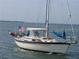 A sailboat on the water with an American flag at 18938 Ayrshire Cir, Port Charlotte, FL 33948
