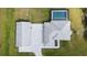This is a bird's eye view of a home with a screened in pool and a detached garage at 2154 Azure Rd, North Port, FL 34286