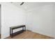 Bedroom features hardwood flooring, white walls, and natural light at 2154 Azure Rd, North Port, FL 34286