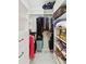 Walk-in closet with custom storage and shelving at 2154 Azure Rd, North Port, FL 34286