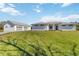 Beautiful home featuring a spacious lawn, two-car garage, and neutral color palette at 2154 Azure Rd, North Port, FL 34286