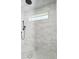 Bright, tiled shower boasts rain shower head and mosaic tile floor at 2154 Azure Rd, North Port, FL 34286
