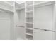 Spacious walk-in closet with custom shelving and ample storage space at 2154 Azure Rd, North Port, FL 34286