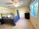 Spacious bedroom with ceiling fan and ample natural light at 22398 Walton Ave, Port Charlotte, FL 33952
