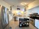 Modern kitchen with stainless steel appliances and island at 22398 Walton Ave, Port Charlotte, FL 33952