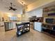 Modern kitchen with stainless steel appliances and island at 22398 Walton Ave, Port Charlotte, FL 33952