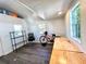 Bright studio featuring two workspaces and a bike at 22398 Walton Ave, Port Charlotte, FL 33952