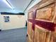 Studio room features painted brick wall and door at 22398 Walton Ave, Port Charlotte, FL 33952