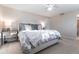 Bedroom with a large bed, lamps on each bedside table and neutral colored walls at 2240 Via Esplanade, Punta Gorda, FL 33950