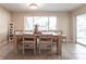 Dining room with a large table, rug, big window and natural sunlight at 2240 Via Esplanade, Punta Gorda, FL 33950