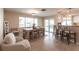 Bright dining room with a neutral color palette, large windows and bar stool seating area at 2240 Via Esplanade, Punta Gorda, FL 33950