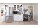 Kitchen view with stainless steel refrigerator, wine storage and beverage cooler at 2240 Via Esplanade, Punta Gorda, FL 33950