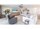 Bright living room with tile floors, modern furnishings, and an area rug at 2240 Via Esplanade, Punta Gorda, FL 33950