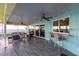 Covered patio boasts comfortable seating and bar area overlooking the water at 2240 Via Esplanade, Punta Gorda, FL 33950