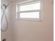 Shower with white tiles and shower head at 2240 Via Esplanade, Punta Gorda, FL 33950