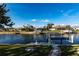Waterfront view with a private dock and boat lift at 2240 Via Esplanade, Punta Gorda, FL 33950