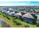 Community overview with waterfront and golf course views at 25228 Longmeadow Dr, Punta Gorda, FL 33955