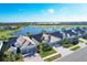 Aerial view of upscale homes by the lake and golf course at 25228 Longmeadow Dr, Punta Gorda, FL 33955