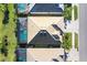 Aerial view showcasing home's roofline and pool area at 25228 Longmeadow Dr, Punta Gorda, FL 33955
