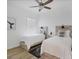 Two twin beds in a bright bedroom with light wood furniture and a whale tail print at 25228 Longmeadow Dr, Punta Gorda, FL 33955
