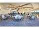 Relaxing outdoor bar and lounge area with comfortable seating at 25228 Longmeadow Dr, Punta Gorda, FL 33955
