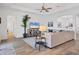 Bright living room with sectional sofa and large TV at 25228 Longmeadow Dr, Punta Gorda, FL 33955
