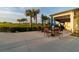 Relax and enjoy the view from the patio seating area at 25228 Longmeadow Dr, Punta Gorda, FL 33955