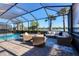 Screened pool and spa with lake view at 25228 Longmeadow Dr, Punta Gorda, FL 33955
