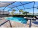 Screened pool and spa with lake view at 25228 Longmeadow Dr, Punta Gorda, FL 33955