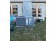 Outdoor air conditioning unit in the backyard at 2544 Elkcam Blvd, Port Charlotte, FL 33952