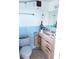 Small bathroom with light blue tile and a vanity at 2544 Elkcam Blvd, Port Charlotte, FL 33952