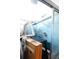 Small bathroom with shower and shelf at 2544 Elkcam Blvd, Port Charlotte, FL 33952