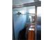 Small bathroom with blue tile and shower at 2544 Elkcam Blvd, Port Charlotte, FL 33952