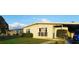 Ranch style home with a large yard and mature trees at 2544 Elkcam Blvd, Port Charlotte, FL 33952