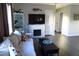 Living room featuring fireplace and built-in shelving at 2544 Elkcam Blvd, Port Charlotte, FL 33952