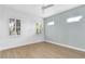 Bedroom with bright natural light and hardwood floors at 27320 Egret Pl, Punta Gorda, FL 33983