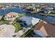 An aerial view showcasing a waterfront property at 2807 Sancho Panza Ct, Punta Gorda, FL 33950