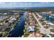 Aerial view of waterfront home with private pool and canal access at 2807 Sancho Panza Ct, Punta Gorda, FL 33950