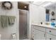 Small bathroom with shower and vanity at 2807 Sancho Panza Ct, Punta Gorda, FL 33950