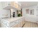 White kitchen features ample counter space and cabinets at 2807 Sancho Panza Ct, Punta Gorda, FL 33950