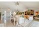 Bright living room featuring light colored furniture and tile floors at 2807 Sancho Panza Ct, Punta Gorda, FL 33950