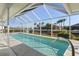 Relaxing screened in pool overlooking the canal at 2807 Sancho Panza Ct, Punta Gorda, FL 33950