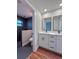 Spa-like bathroom with double vanity and walk-in shower at 2920 Barry Rd, North Port, FL 34286
