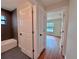 Hallway featuring a bathroom, bedroom, and closet at 2920 Barry Rd, North Port, FL 34286