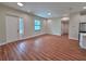 Bright living room with hardwood floors and an open floor plan at 2920 Barry Rd, North Port, FL 34286