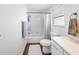 Clean and bright bathroom with tub shower combo and updated vanity at 325 San Benito Ave, North Port, FL 34287