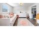 Bedroom with daybed, dresser, and view into kitchen at 325 San Benito Ave, North Port, FL 34287