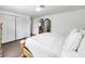 Bedroom with a queen-size bed and built-in closet at 325 San Benito Ave, North Port, FL 34287